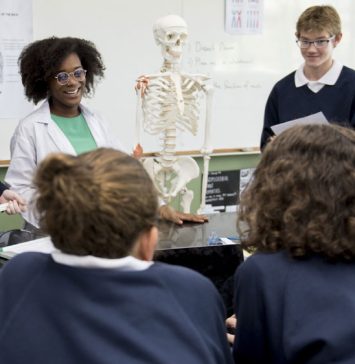 Instructors and students discussing Anatomy and Physiology topics.