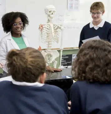 Instructors and students discussing Anatomy and Physiology topics.