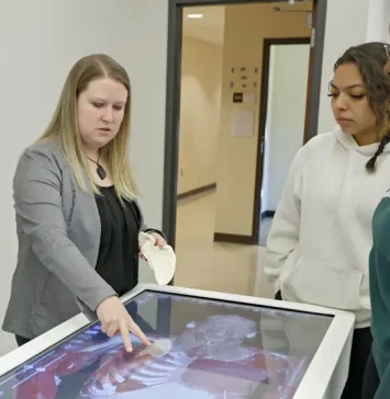 Students exploring 3D anatomical concepts necessary for spatial understanding and hands-on exploration of anatomy and physiology.